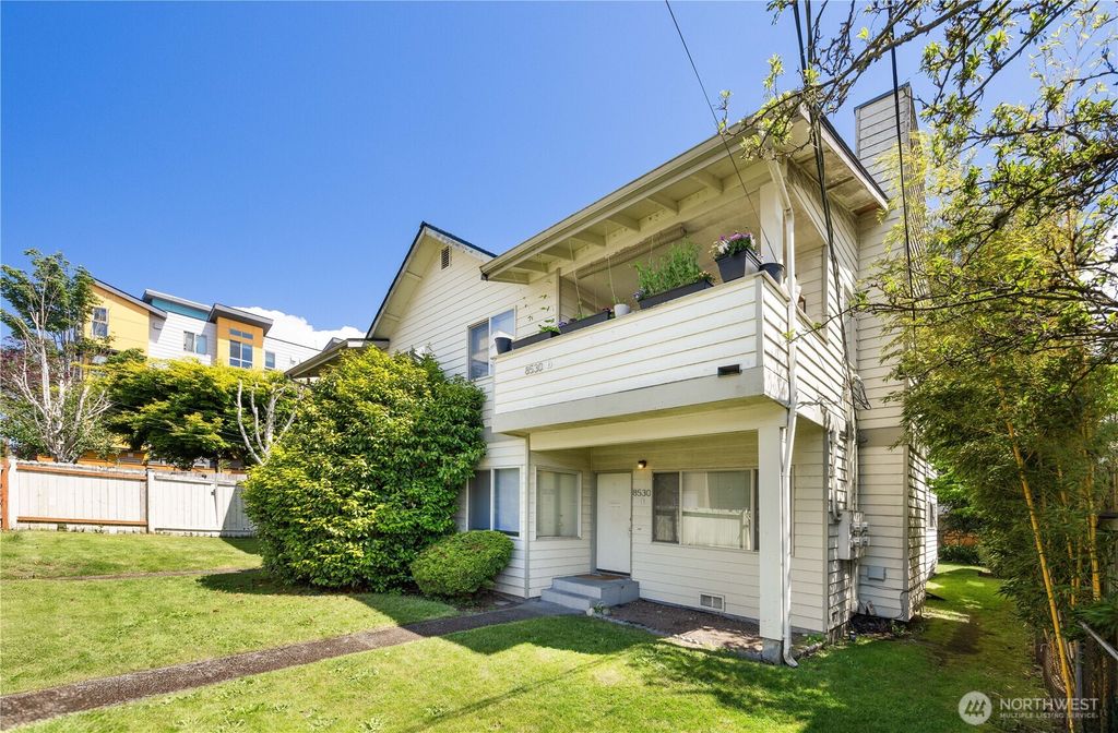 Photo of 8530 Nesbit Avenue N, Seattle, WA 98103 (MLS # 2382021)