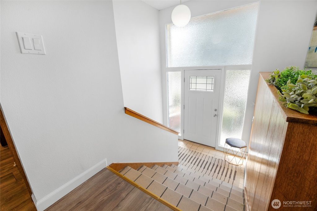 Photo of 6610 S 127th Place, Seattle, WA 98178 (MLS # 2353422)