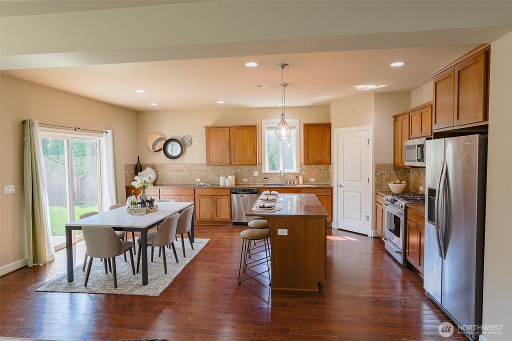 Photo of 208 Ilwaco Place SE, Renton, WA 98059 (MLS # 2574679)