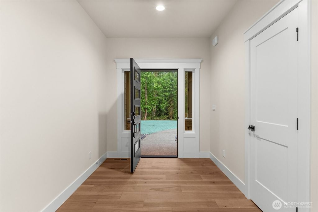 Photo of 5621 SE Aloha Lane, Port Orchard, WA 98367 (MLS # 2458939)