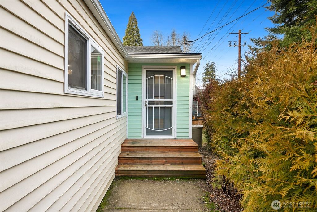 Photo of 10405 8th Avenue NE, Seattle, WA 98125 (MLS # 2330455)