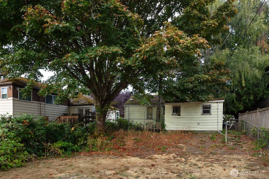 Photo of 5647 38th Avenue SW, Seattle, WA 98126 (MLS # 2577946)