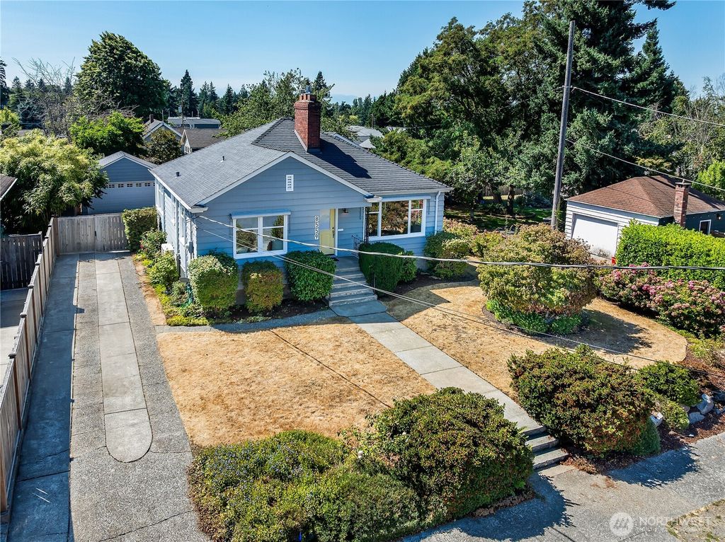 Photo of 8559 25th Avenue NW, Seattle, WA 98117 (MLS # 2414196)