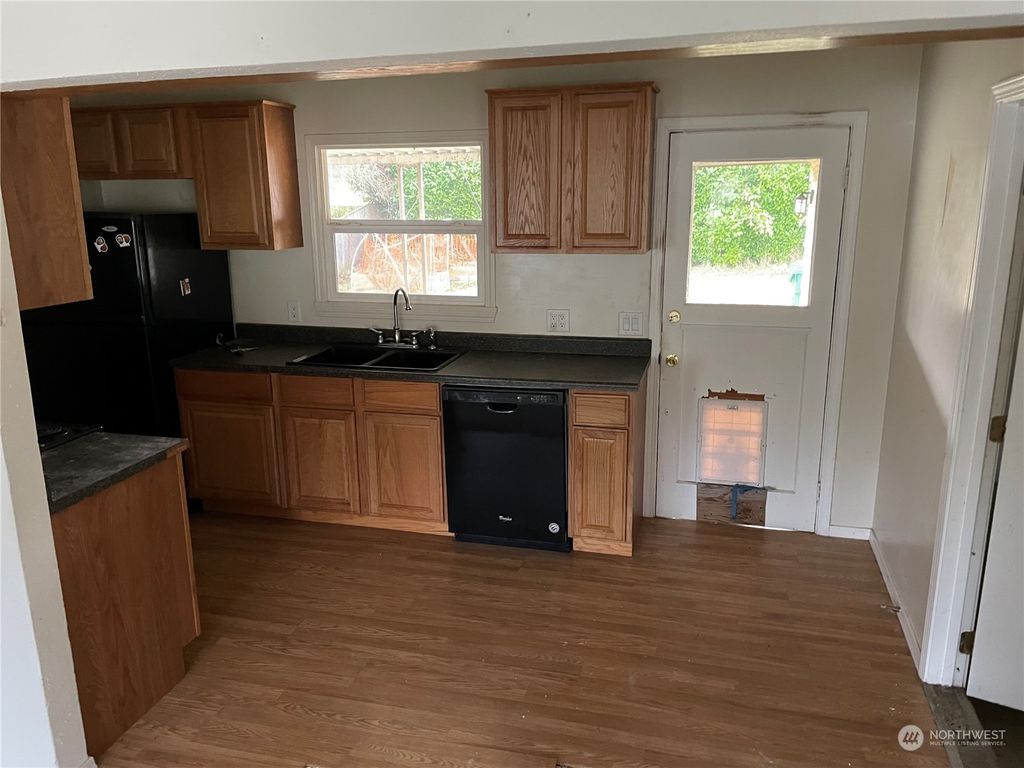 Photo of 10314 Dibble Avenue NW, Seattle, WA 98177 (MLS # 2046882)