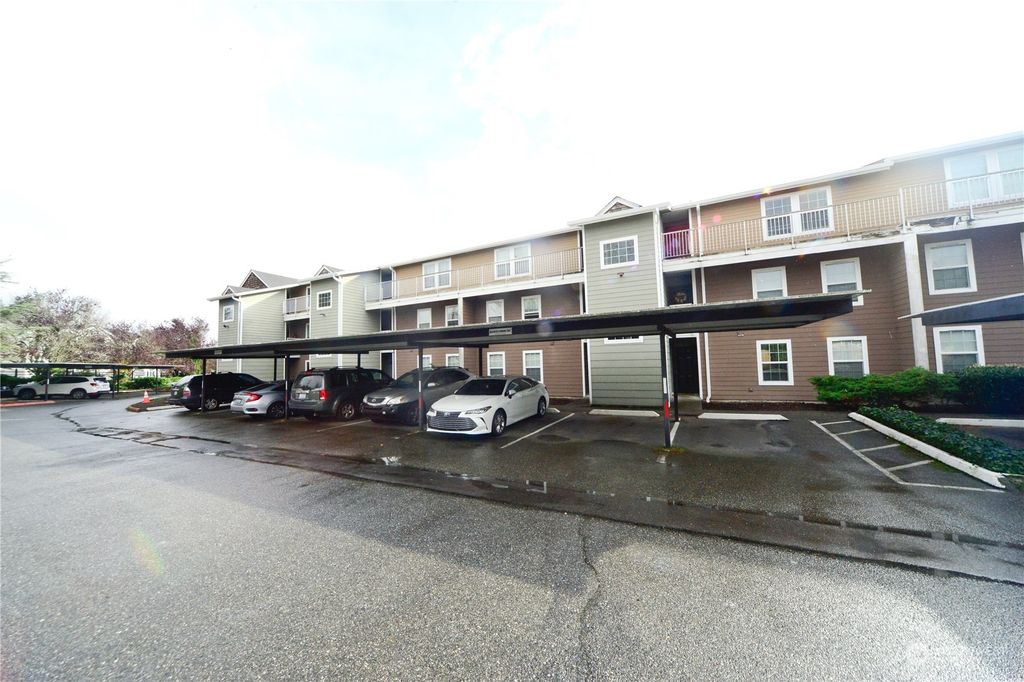 Photo of 9815 Holly Drive #A103, Everett, WA 98204 (MLS # 2307695)