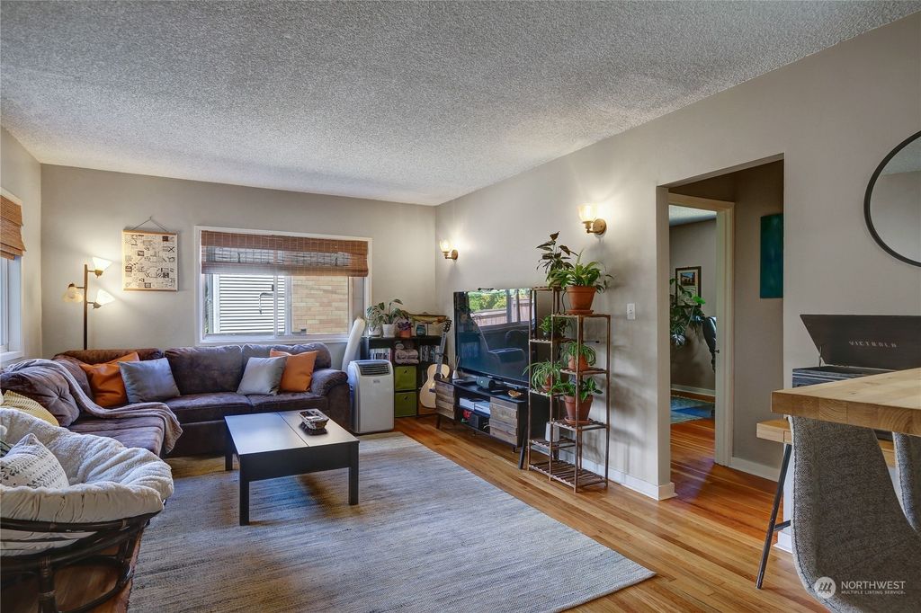 Photo of 8826 32nd Avenue SW, Seattle, WA 98126 (MLS # 2137457)