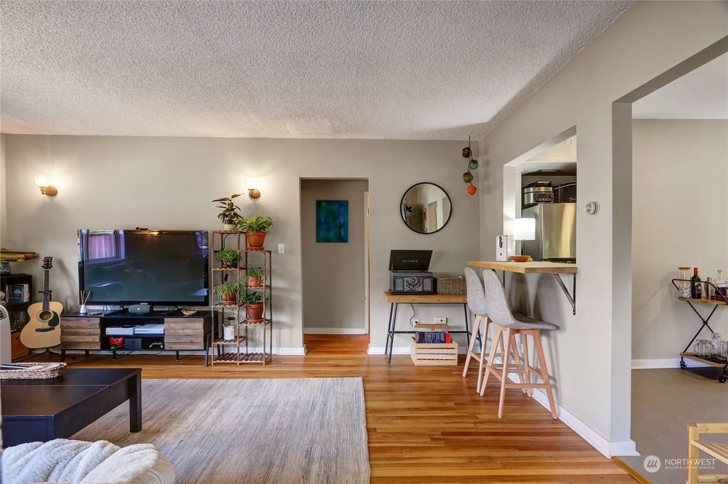 Photo of 8826 32nd Avenue SW, Seattle, WA 98126 (MLS # 2137457)