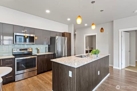 Photo of 1085 103rd Avenue NE #100, Bellevue, WA 98004 (MLS # 2524110)