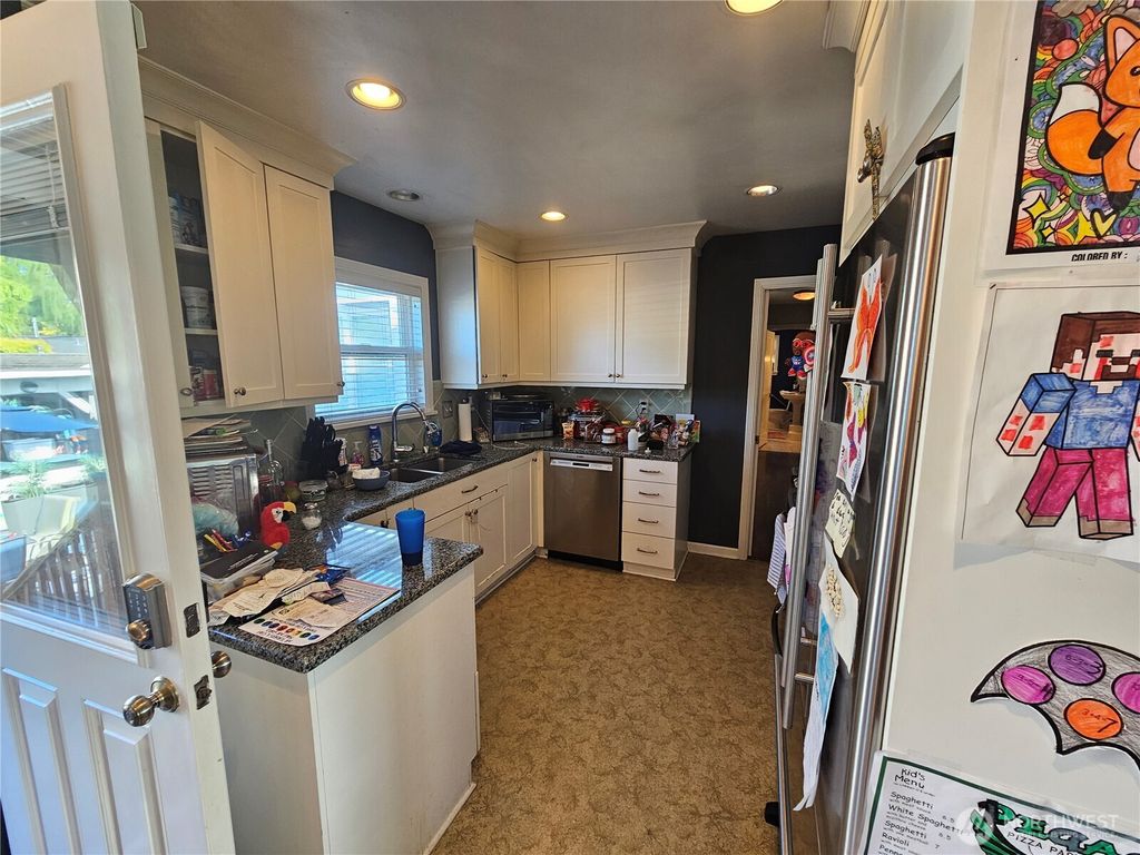 Photo of 3039 63rd Avenue SW, Seattle, WA 98116 (MLS # 2355998)