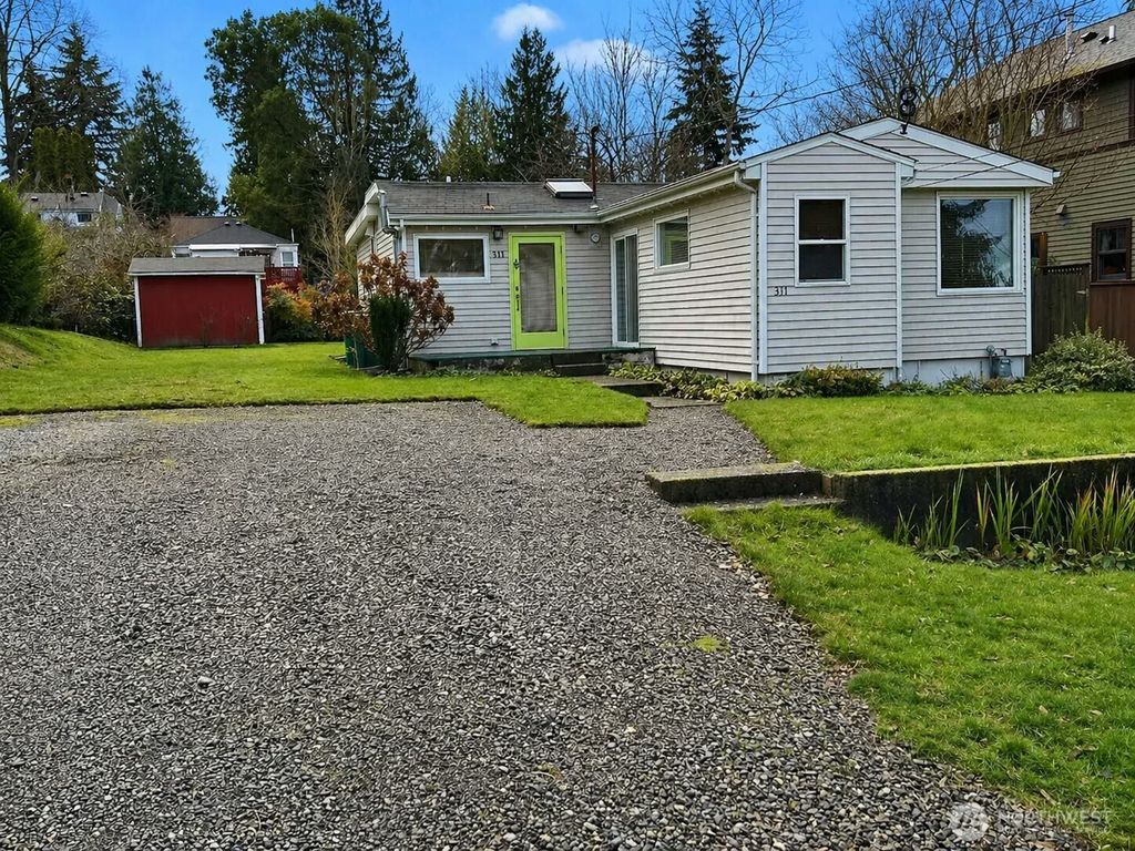 Photo of 311 NE 95th St St, Seattle, WA 98115 (MLS # 2515139)