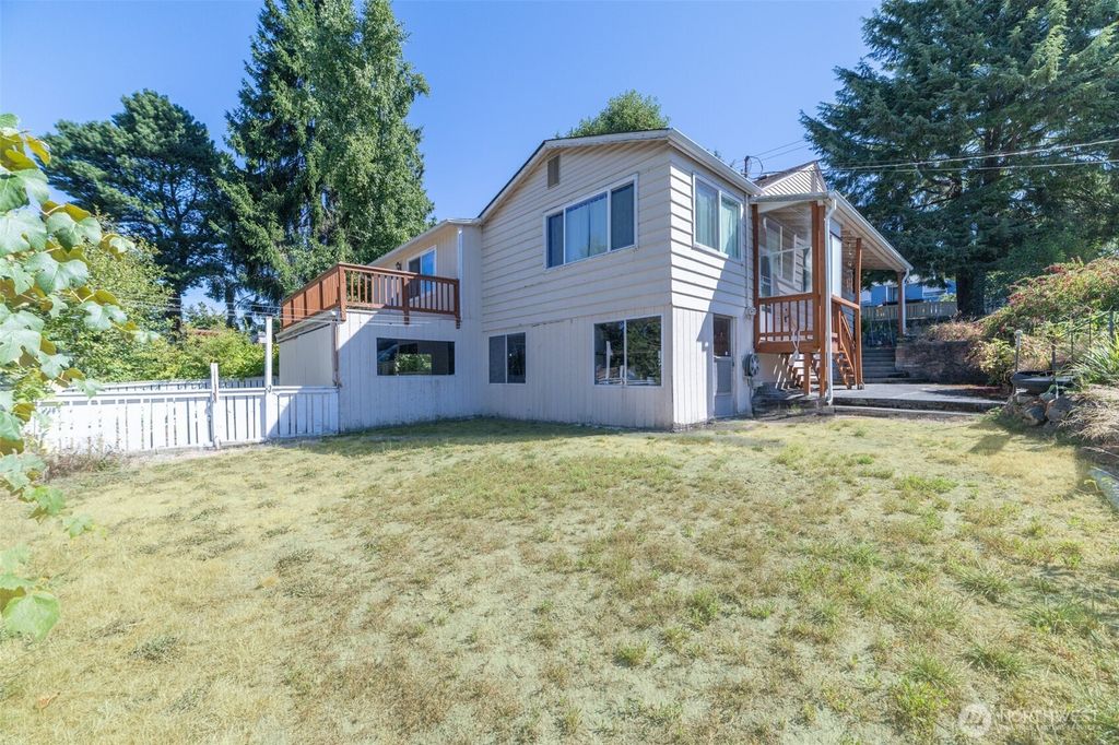 Photo of 10471 6th Avenue SW, Seattle, WA 98146 (MLS # 2421160)