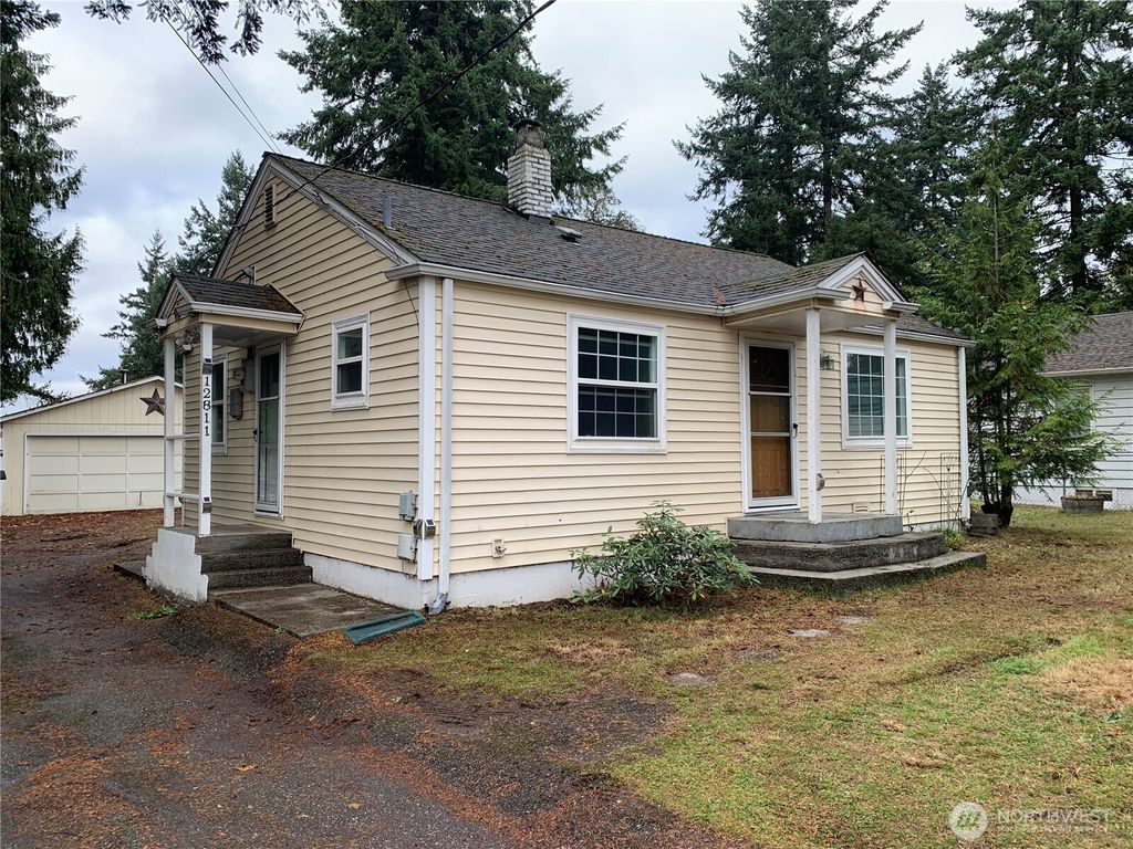 Photo of 12811 10th Avenue S, Burien, WA 98168 (MLS # 2452415)