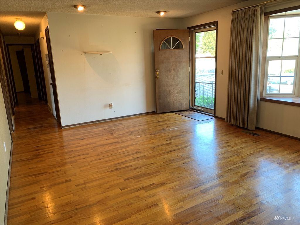 Photo of 11845 11th Avenue S, Seattle, WA 98168 (MLS # 1951272)