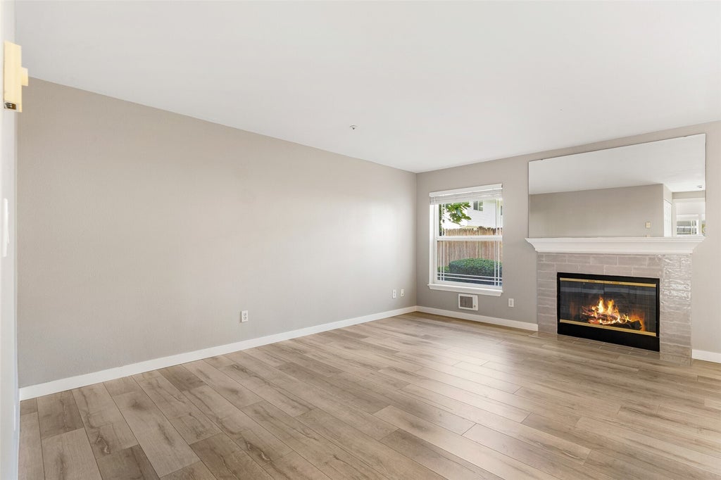 Photo of 9727 18th Avenue W #A103, Everett, WA 98204 (MLS # 2595123)