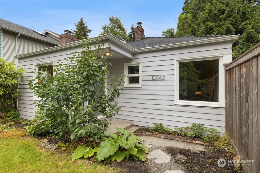 Photo of 12042 35th Avenue NE, Seattle, WA 98125 (MLS # 2254799)