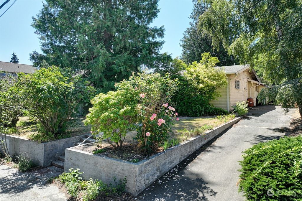 Photo of 7047 8th Avenue NW, Seattle, WA 98117 (MLS # 2265194)