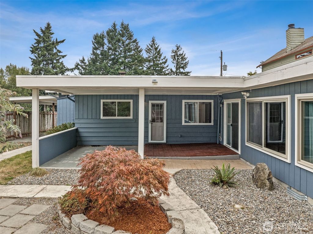 Photo of 10705 11th Avenue SW, Seattle, WA 98146 (MLS # 2424647)
