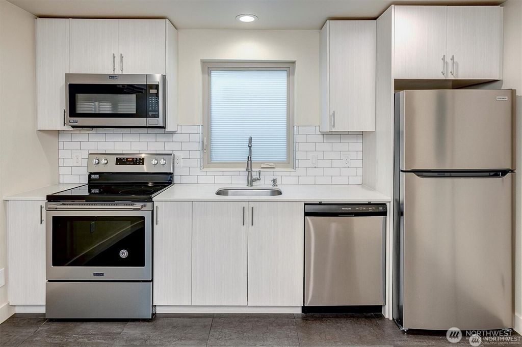 Photo of 3325 Martin Luther King Jr Way S, Seattle, WA 98144 (MLS # 2404465)