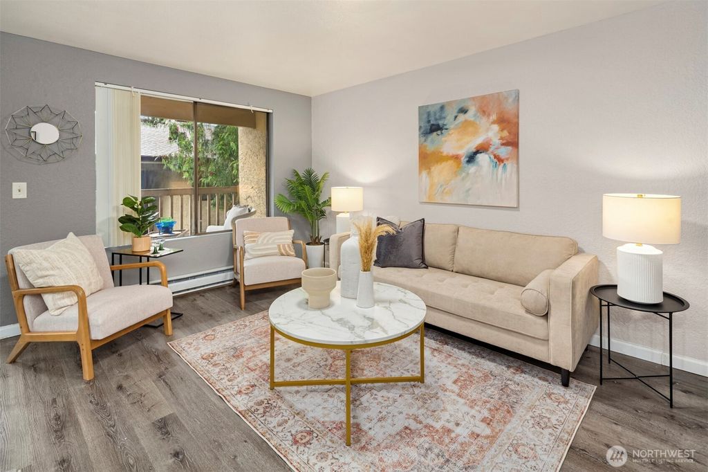 Photo of 10330 SE 6TH Street St #A2, Bellevue, WA 98004 (MLS # 2459457)