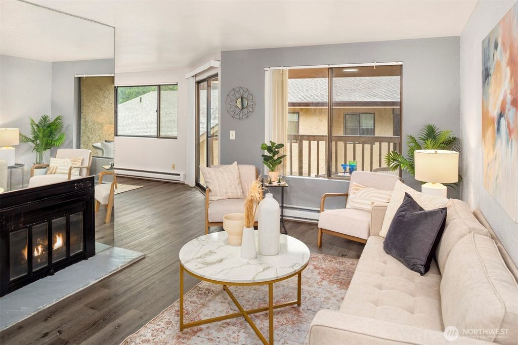 Photo of 10330 SE 6TH Street St #A2, Bellevue, WA 98004 (MLS # 2459457)