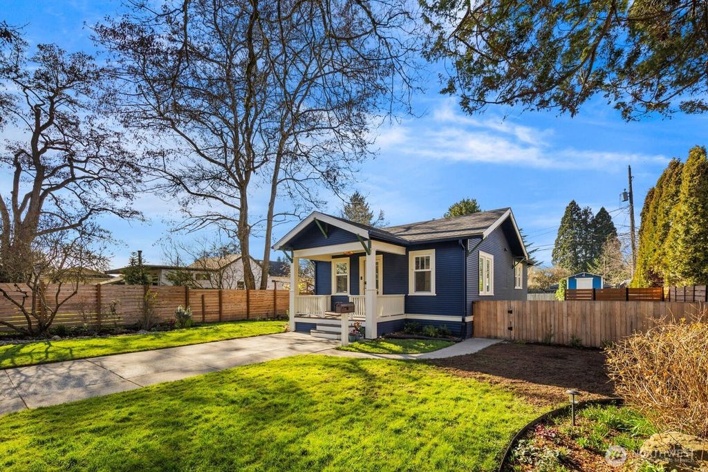 Photo of 7941 30th Avenue SW, Seattle, WA 98126 (MLS # 2476684)