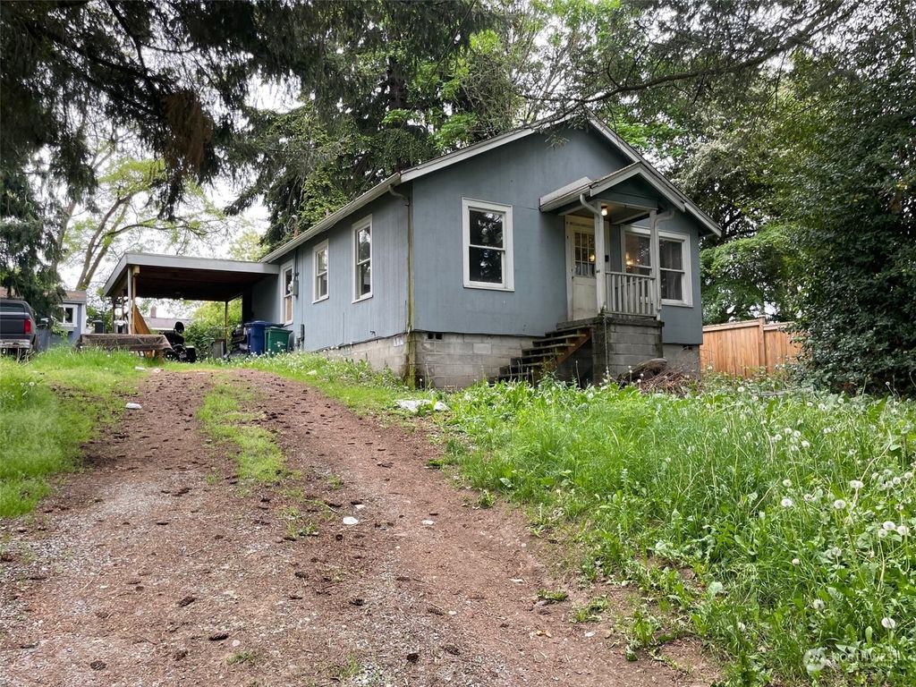 Photo of 10744 17th Avenue SW, Seattle, WA 98146 (MLS # 2071898)