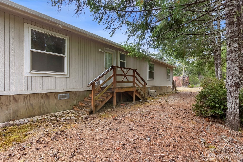 Photo of 910 NE Tahuya River Road, Tahuya, WA 98588 (MLS # 2578579)