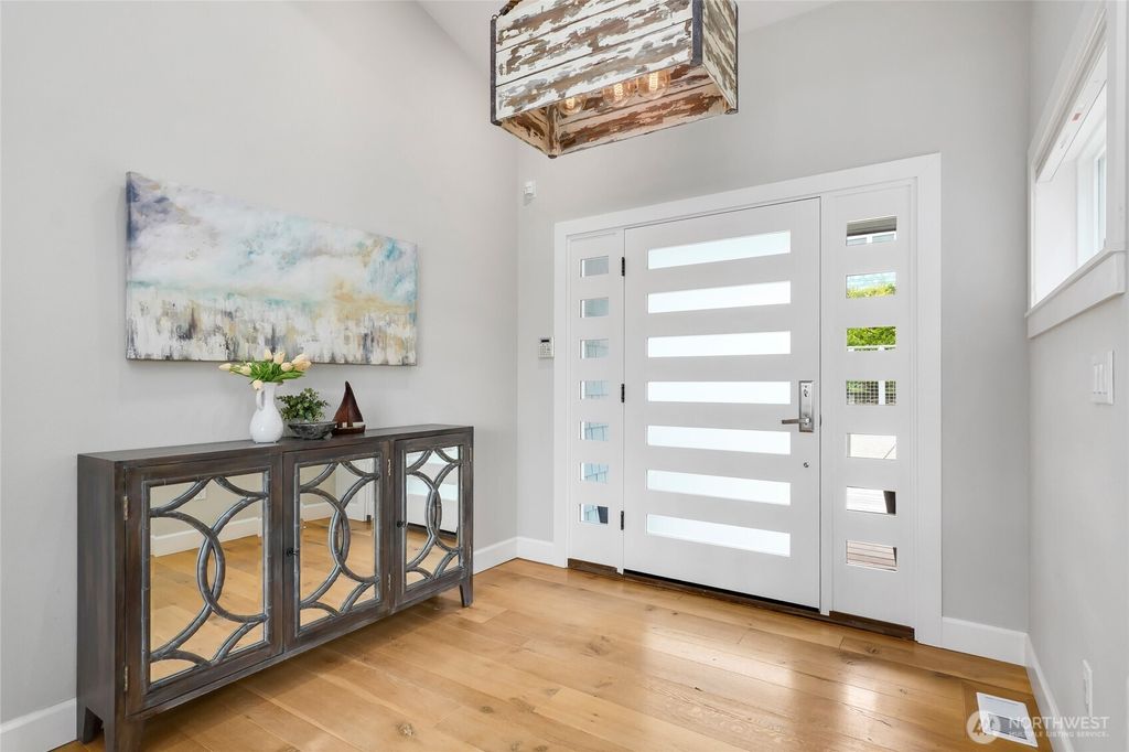 Photo of 10475 Manitou Beach Drive NE, Bainbridge Island, WA 98110 (MLS # 2482851)