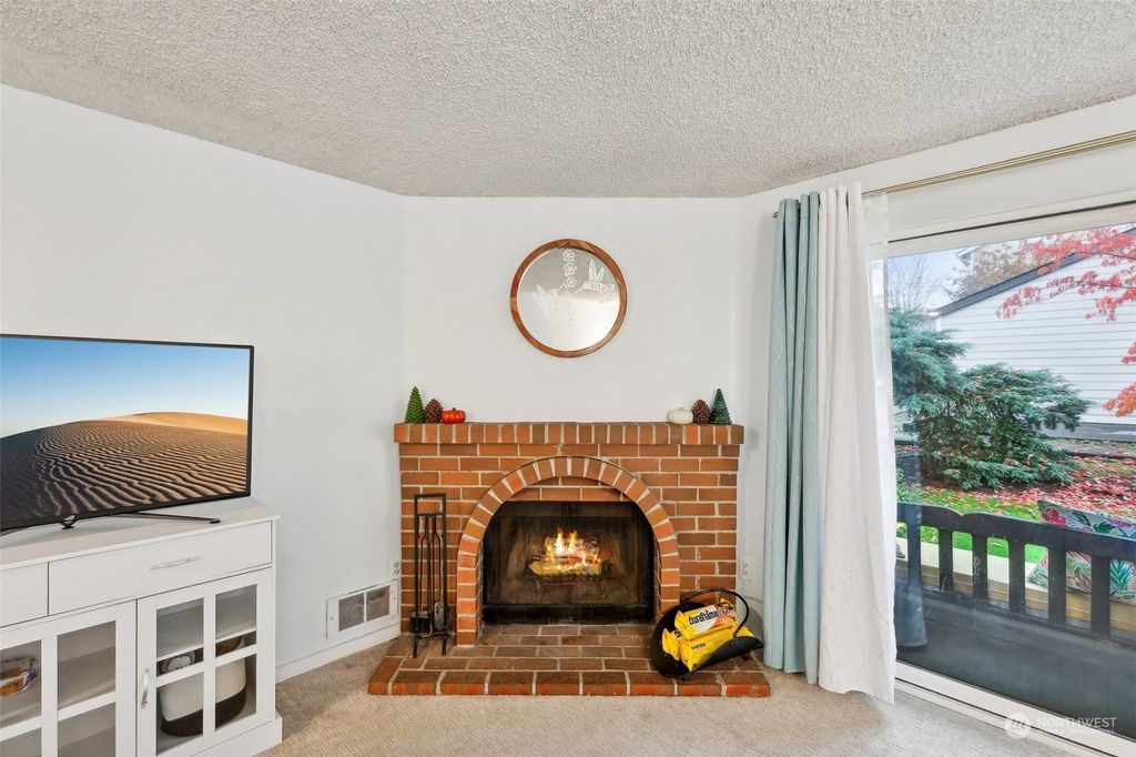 Photo of 12508 NE 142nd Lane #C-106, Kirkland, WA 98034 (MLS # 2309472)