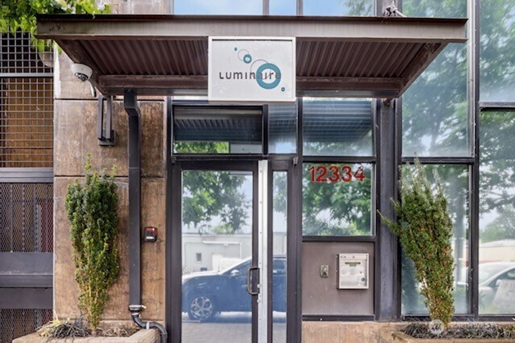 Photo of 12334 31st Avenue NE #305, Seattle, WA 98125 (MLS # 2358267)