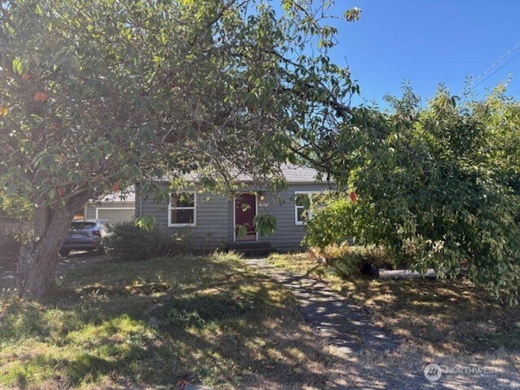 Photo of 9227 Mary Avenue NW, Seattle, WA 98117 (MLS # 2434096)
