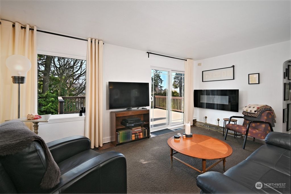 Photo of 8409 41st Avenue SW, Seattle, WA 98136 (MLS # 2039839)