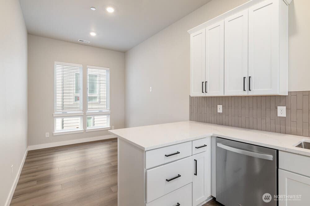 Photo of 12810 66th Avenue S, Seattle, WA 98178 (MLS # 2534359)