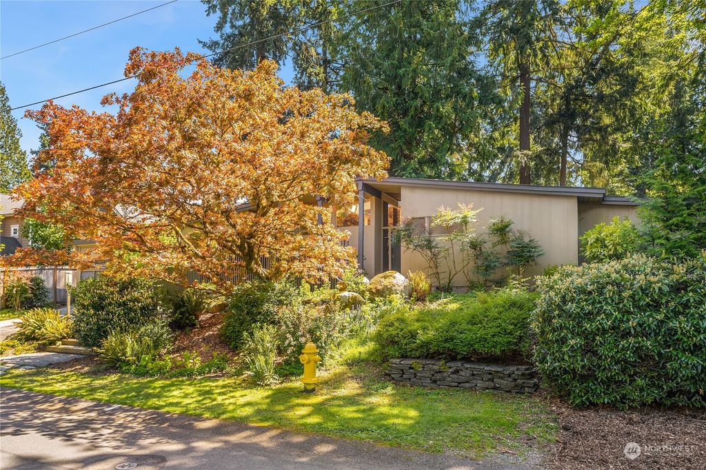 Photo of 10613 Woodhaven Lane, Bellevue, WA 98004 (MLS # 2077077)