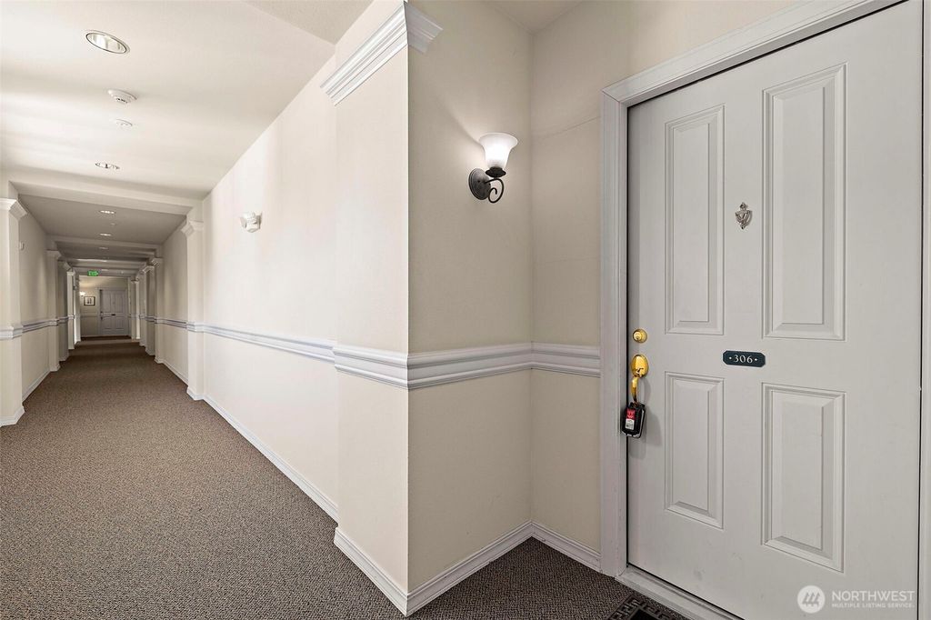 Photo of 6831 NE 170th Street #306, Kenmore, WA 98028 (MLS # 2424957)