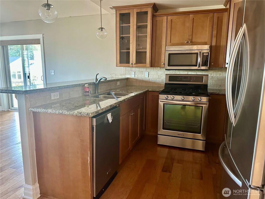 Photo of 6415 Hunt Highlands Loop #24A, Gig Harbor, WA 98335 (MLS # 2460095)