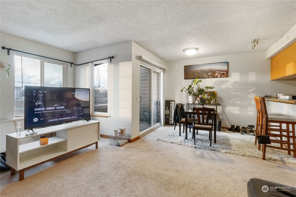 Photo of 3233 NE 12th Street #311, Renton, WA 98056 (MLS # 2195790)