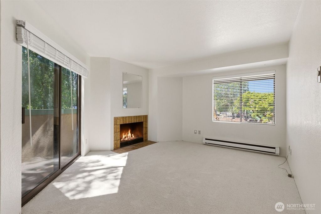 Photo of 3024 NE 143rd Street #301, Seattle, WA 98125 (MLS # 2529407)