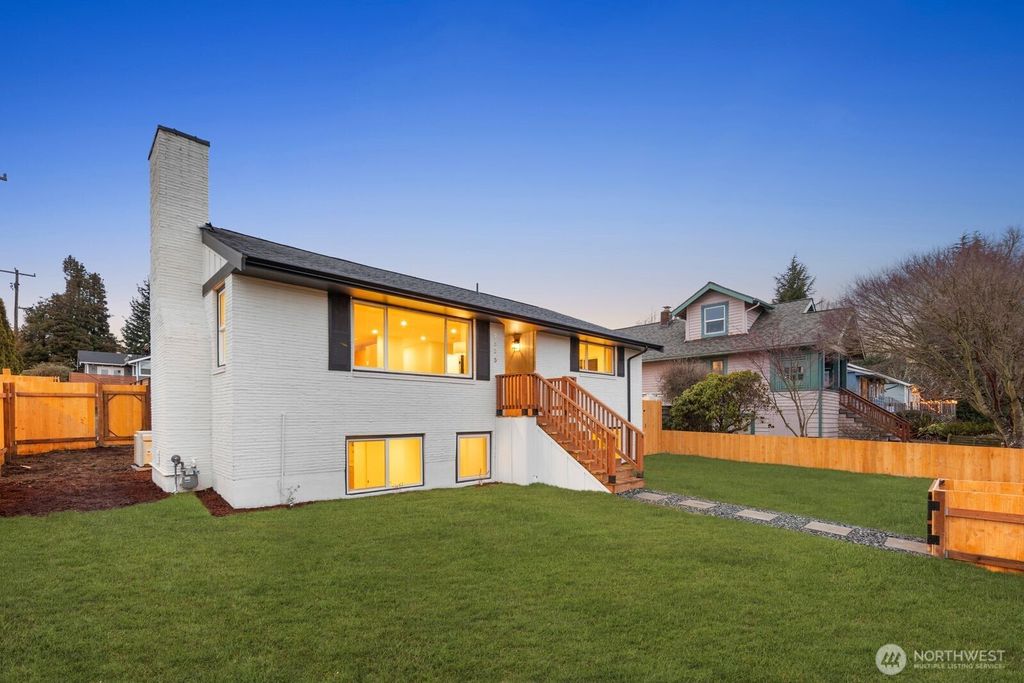 Photo of 7555 32nd Avenue SW, Seattle, WA 98126 (MLS # 2464948)