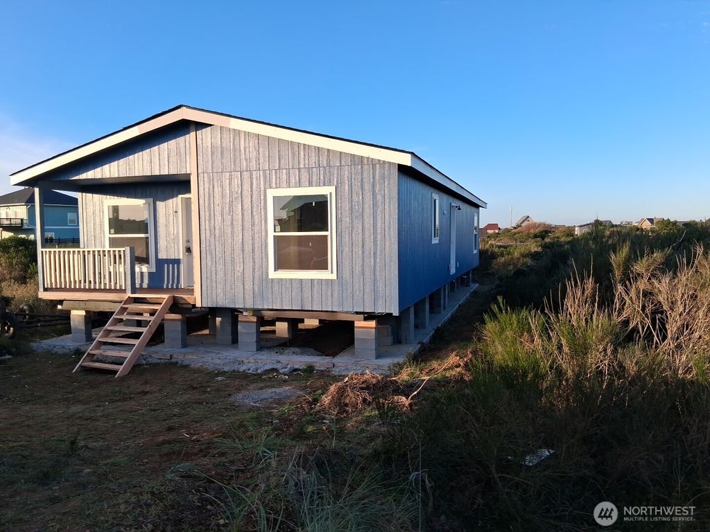 Photo of 444 W Wind Street NW, Ocean Shores, WA 98569 (MLS # 2459958)