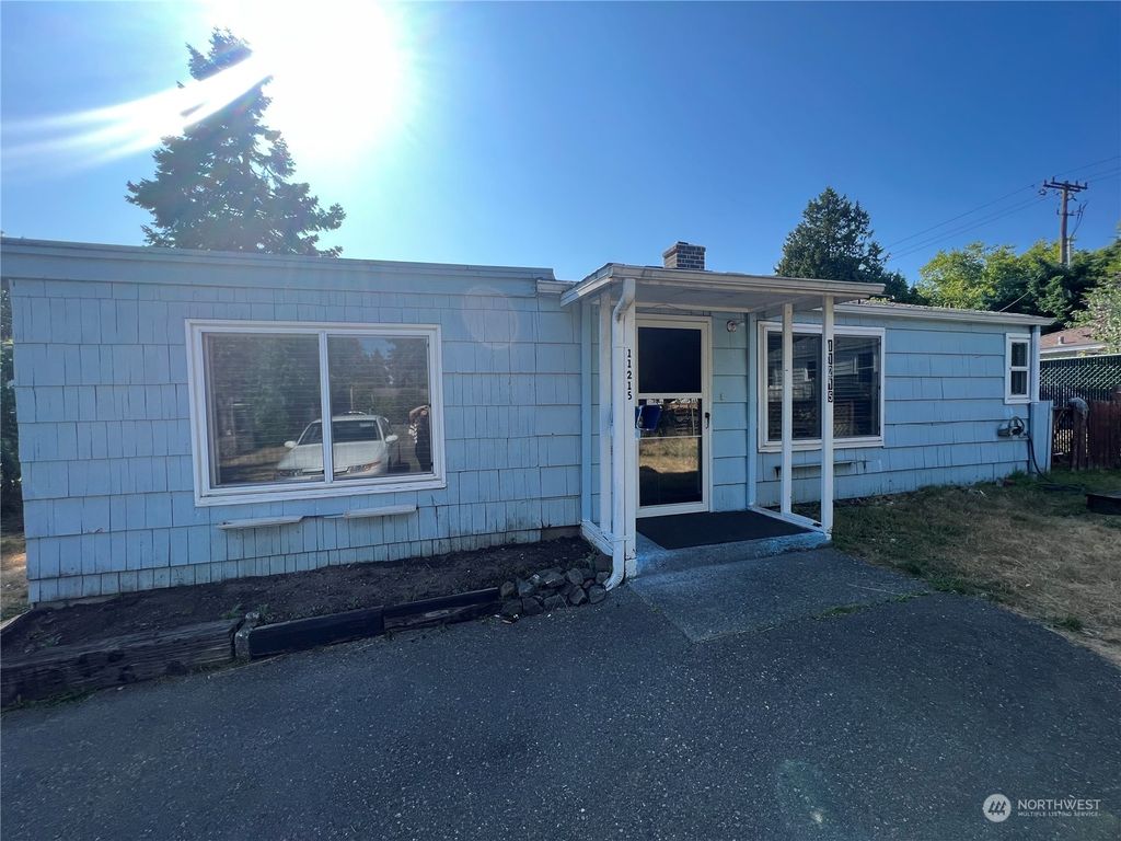 Photo of 853 S 112th Street, Seattle, WA 98168 (MLS # 2163042)