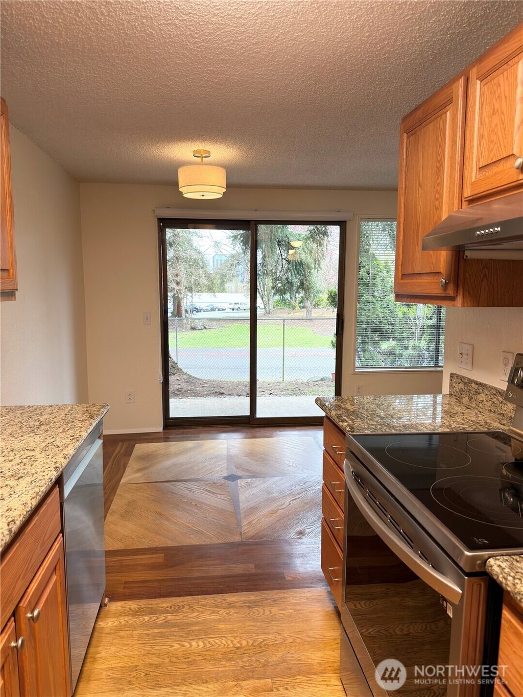 Photo of 12510 NE 117th Place #B3, Kirkland, WA 98034 (MLS # 2540251)