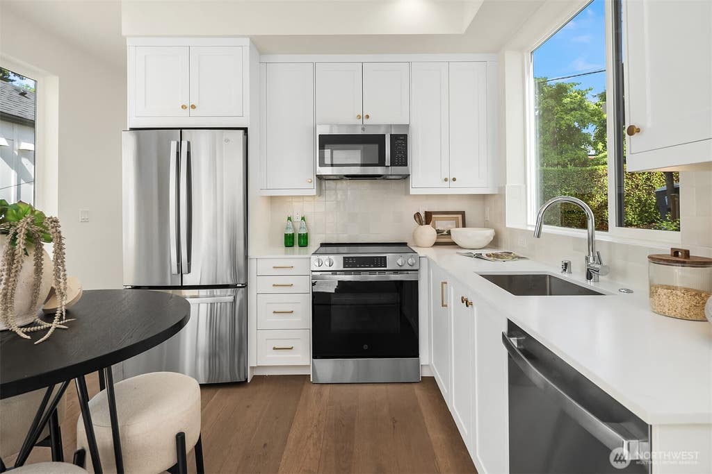 Photo of 3446 13th Avenue W #B, Seattle, WA 98119 (MLS # 2551394)