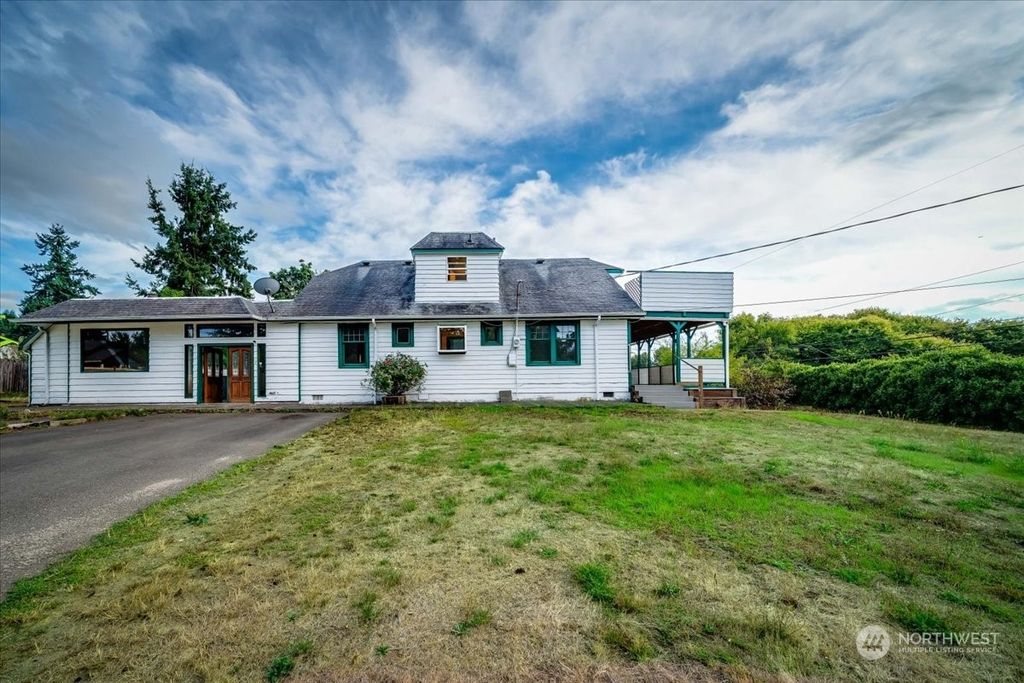 Photo of 9826 26th Avenue SW, Seattle, WA 98106 (MLS # 2270242)