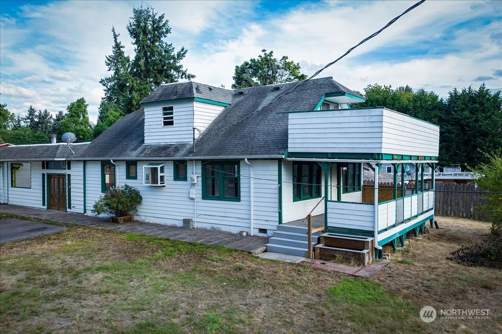 Photo of 9826 26th Avenue SW, Seattle, WA 98106 (MLS # 2270242)