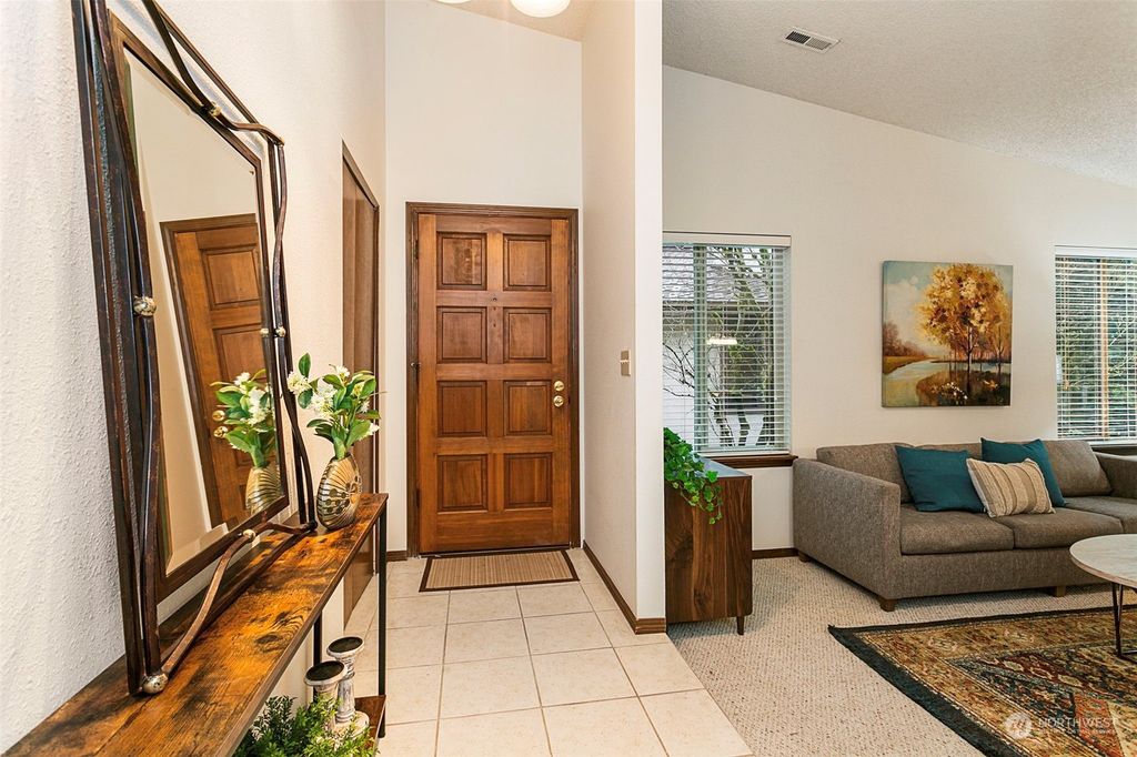 Photo of 16012 Village Green Drive #A, Mill Creek, WA 98012 (MLS # 2190365)