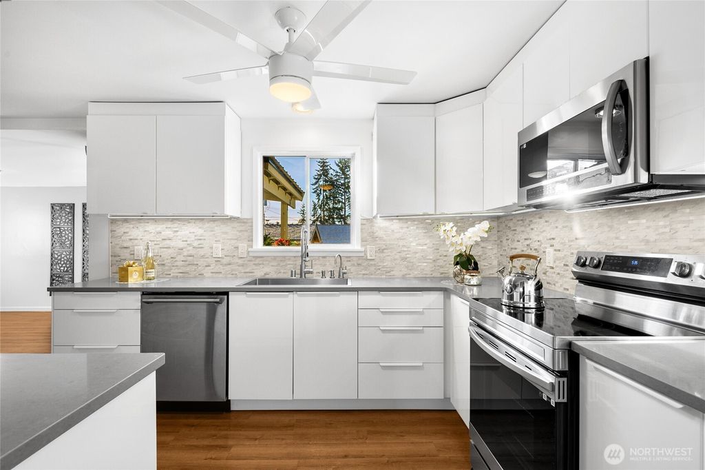 Photo of 4515 NE 17th Place, Renton, WA 98059 (MLS # 2458722)