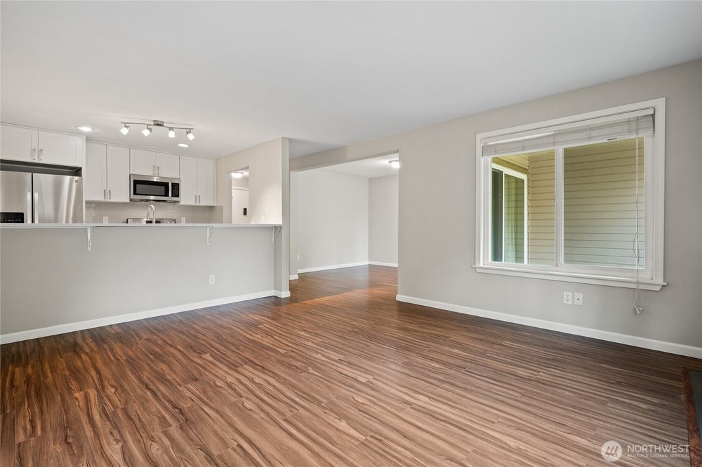 Photo of 4415 145th Avenue NE #H5, Bellevue, WA 98007 (MLS # 2476396)