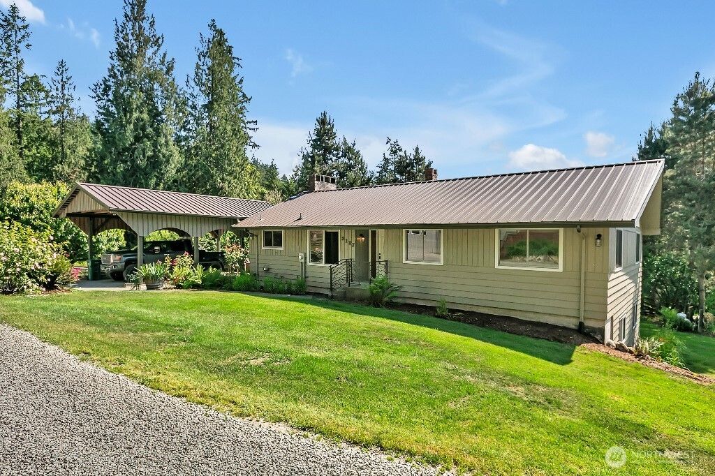Photo of 3107 W Snoqualmie River Road NE, Carnation, WA 98014 (MLS # 2401181)