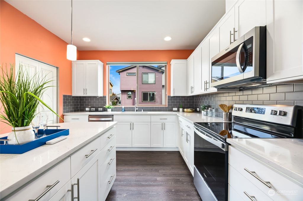 Photo of 1060 SW 100th Street, Seattle, WA 98106 (MLS # 2302327)